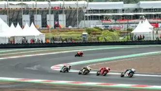 Riders taken on a corner at mandalika international 1