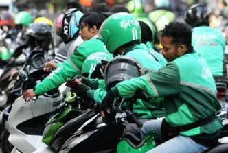 Pengemudi ojek online menantikan perpres ojol yang memihak