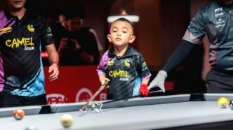 5 year old kid and his foot board biliard tournament