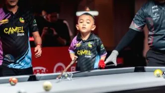 5 year old kid and his foot board biliard tournament