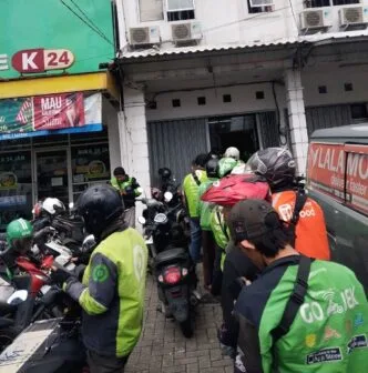 Dampak Layanan Berbayar, Penghasilan Pengemudi Ojol Kian Menyusut