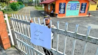 Sekolah di malaysia terpaksa tutup karena asap