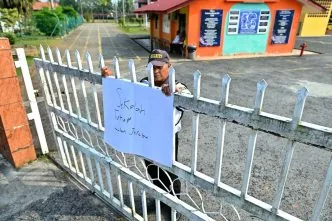 Sekolah di malaysia terpaksa tutup karena asap