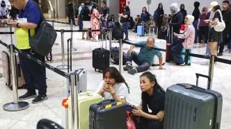 Calon penumpang di bandara soekarno hatta tertahan akibat penebrangan ditunda