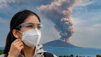 Perlindungan dari abu vulkanik masker dan kacamata